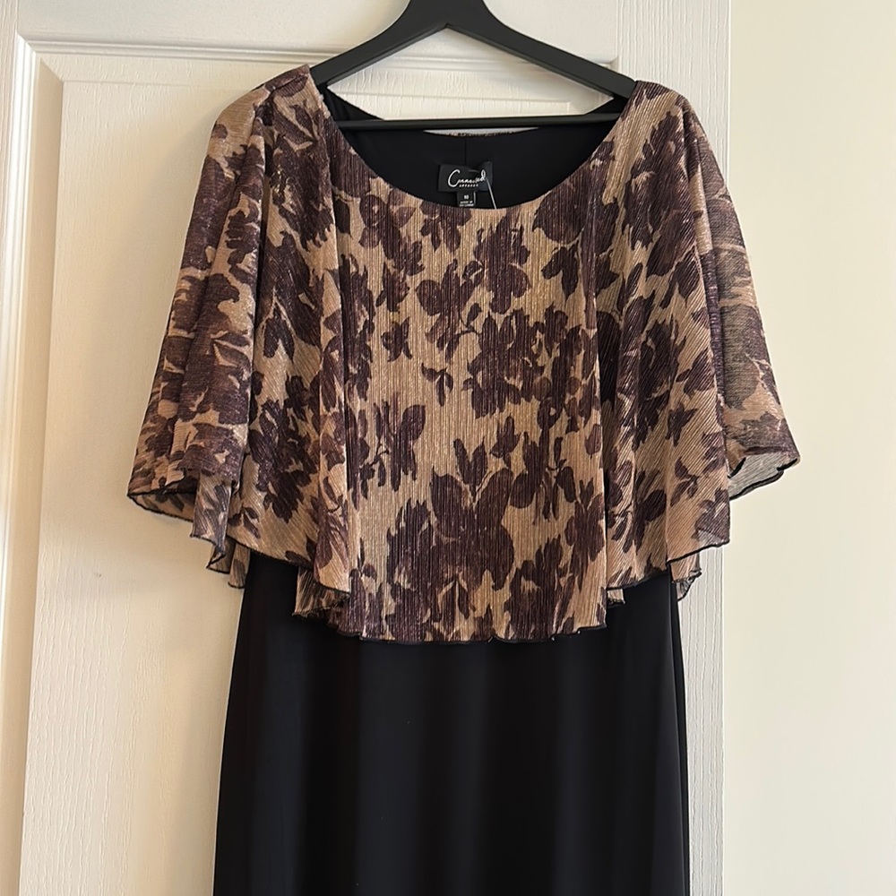 Black and tan party dress, size 10 and fits 12 it’s stretch, NWOT
So soft